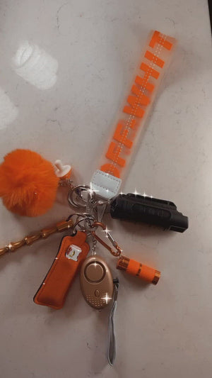 
            
                Load and play video in Gallery viewer, Orange Off-White Safety Wristlet
            
        