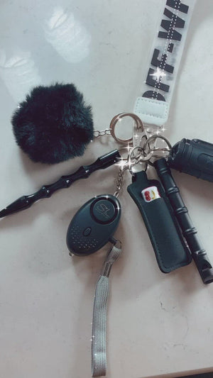 
            
                Load and play video in Gallery viewer, Black Off-White Safety Wristlet
            
        